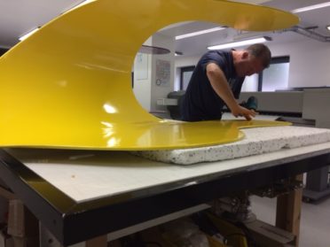 Trimming the Banksy windmill blades in our workshop