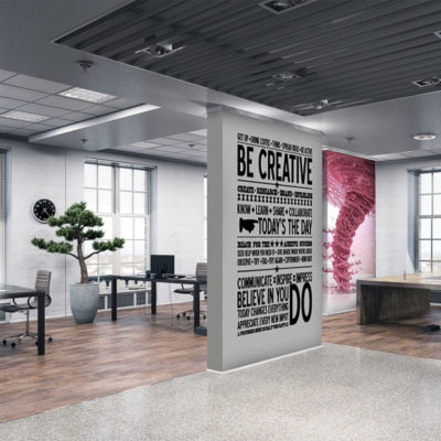 Signs and graphics used in an office environment on a wall