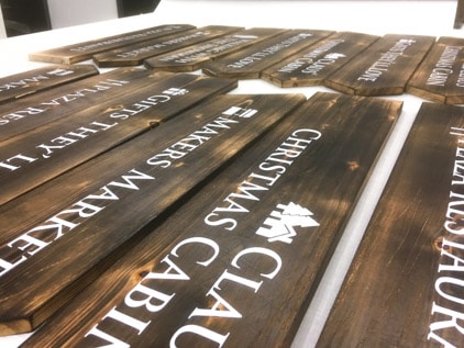 Natural Wooden Signage - Being fabricated with white vinyl cut lettering