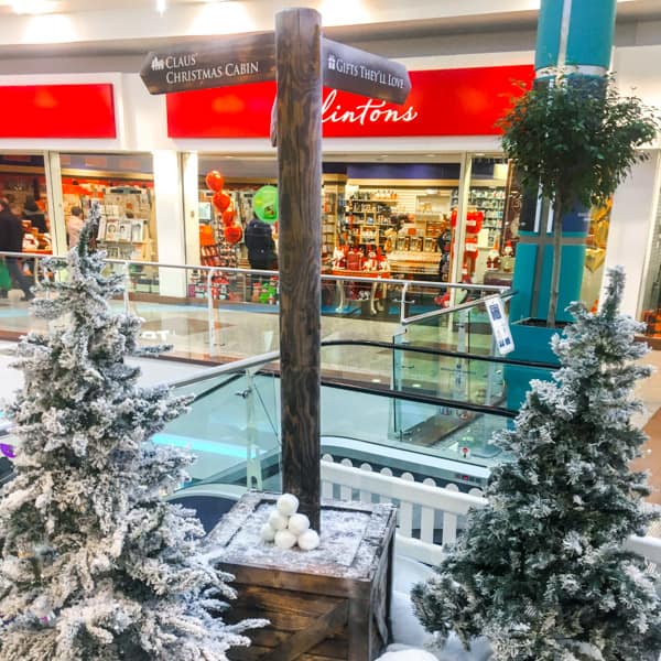 Natural Wooden Signage at Shopping Centre - Wide Shot