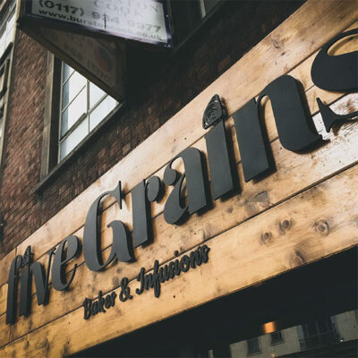 Routed letters and fascia utilising natural materials for a restaurant