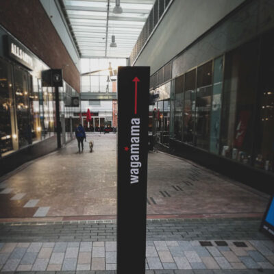 Monolith wayfinding sign in a shopping centre