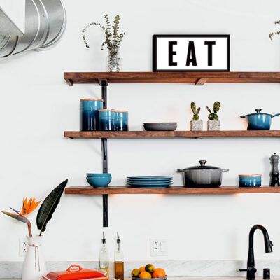 Small illuminated sign for a kitchen shelf