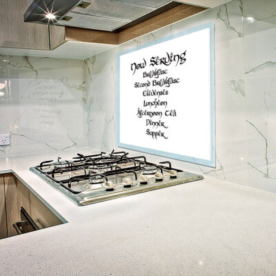 Custom illuminated splashback for a kitchen