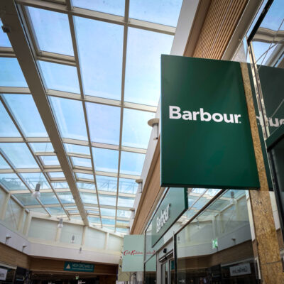 Close up of projecting sign for Barbour retail unit at Gloucester Quays