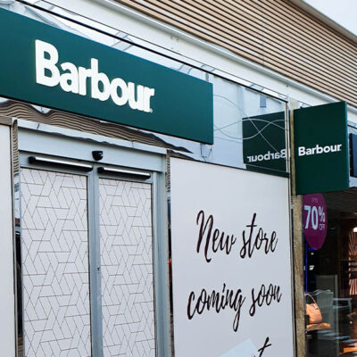 Shopfront signage for Barbour retail unit at Gloucester Quays prior to opening