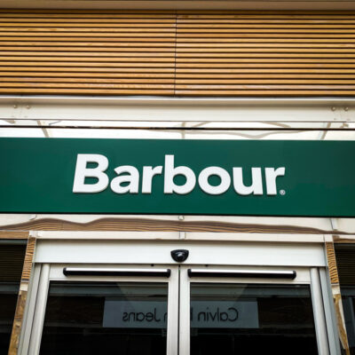 Close up of main fascia sign for Barbour retail unit at Gloucester Quays