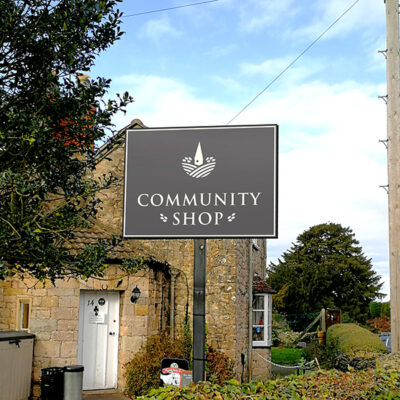 A Post Panel Signs for a community shop